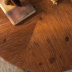 Table basse ronde avec piètement en métal et plateau en bois
