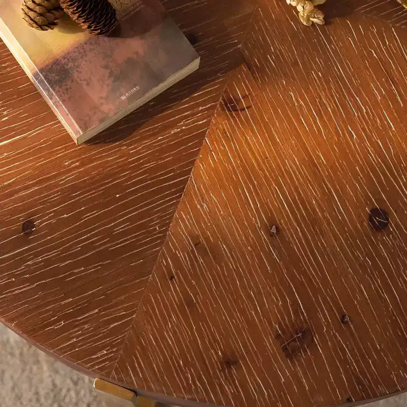 Table basse ronde avec piètement en métal et plateau en bois