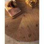 Table basse ronde avec piètement en métal et plateau en bois