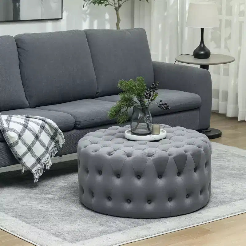 Table basse pouf ronde avec revêtement en velours et capitonnage à boutons
