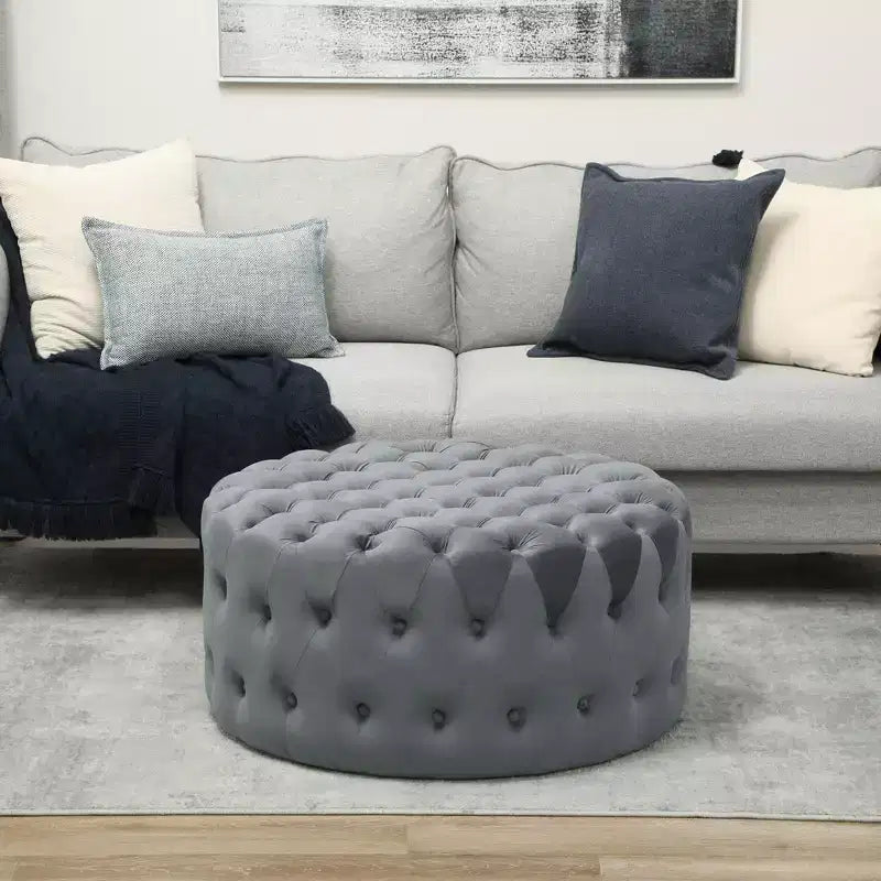 Table basse pouf ronde avec revêtement en velours et capitonnage à boutons