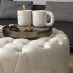Table basse pouf ronde avec revêtement en velours et capitonnage à boutons