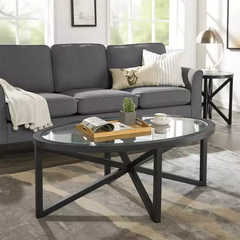 Table basse ronde en verre avec piétement trépied en bois